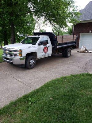 Truck used to haul off old roof and trash.