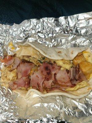 MIgas taco add potatoes and ham.