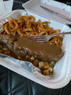 Meatloaf dinner with curly fries