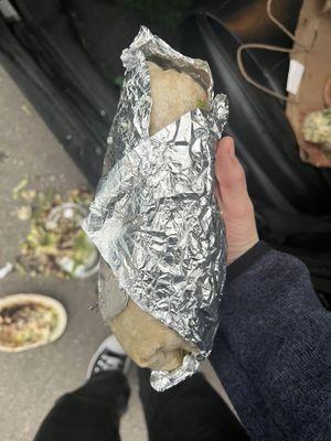 burrito not even fully wrapped (bottom of the bag ripped and spilled bowl on the concrete too lol dying inside)