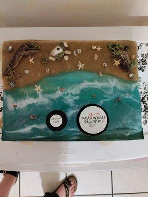 An ocean scene created with resin. I used methods I learned from Artist Till Death videos on YouTube. & 2 products from their store.