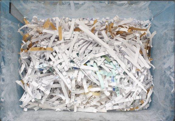 Bin of paper shreds before they are recycled