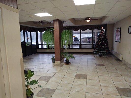 Here's the main lobby. Once it had benches for tenants to sit.Then chairs were used due to the Virus. Now gone, certain tenants, no masks.