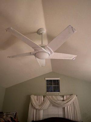 Bedroom ceiling fan on sloped ceiling.