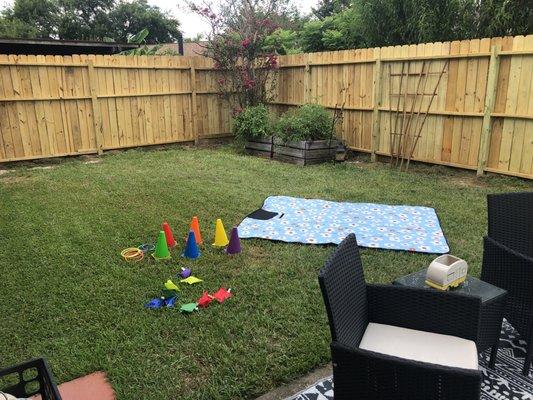 The backyard is open to run, play, or rest with a good book or snack. This is just one side of the yard.