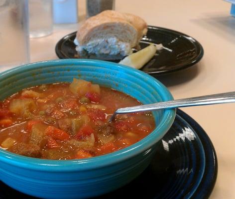 Veggie soup with a chicken salad sandwich.