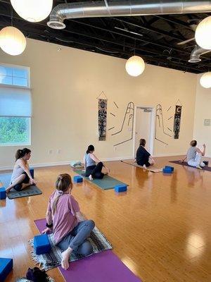 Half Lord of the Fish pose in our Wednesday p.m. Energetic Yoga. 
This seated spinal twist improves posture, & stimulates digestive tract