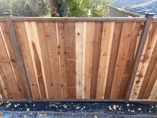 Fence Style: 6' Redwood Picture Frame with exposed posts for solar lights.