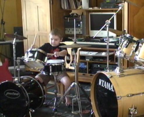 Wow! Drum lessons side by side with my teacher. He really makes it fun!