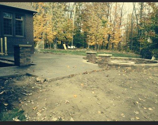 Patio, wall, steps, and fire pit