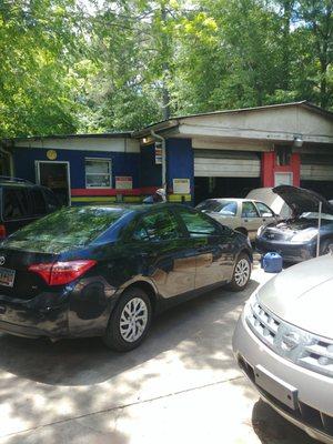 Mr. Leon Gant busy inspecting my car.  I trust this guy with all my vehicles.