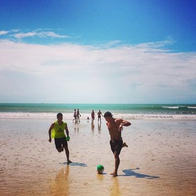 Pick-up  (pelada)  soccer (futebol) on the beach (na praia)  at ponta negra in Natal, Brasil.