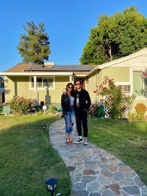 My partner and I after we purchased our first home. Thank you, Marcy!