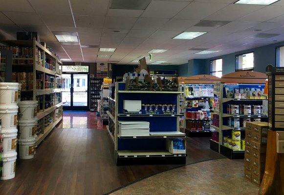 Interior shelving with a wide variety of products, facing the door