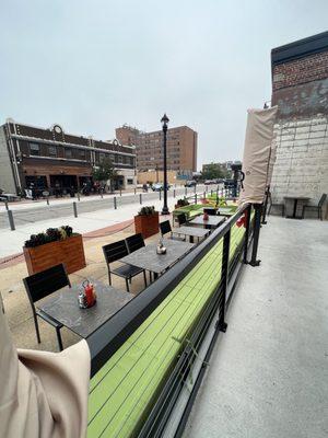 Patio seating, looking down Western.