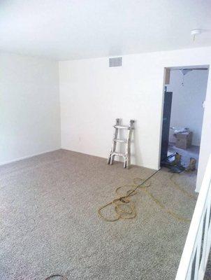 Bed room remodel new flooring paint and texture of walls and baseboards