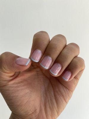 Gel French Manicure with baby blue tips and light pink coat.