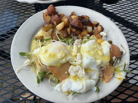 Benedict with Smoked Salmon, micro greens, capers, and feta.