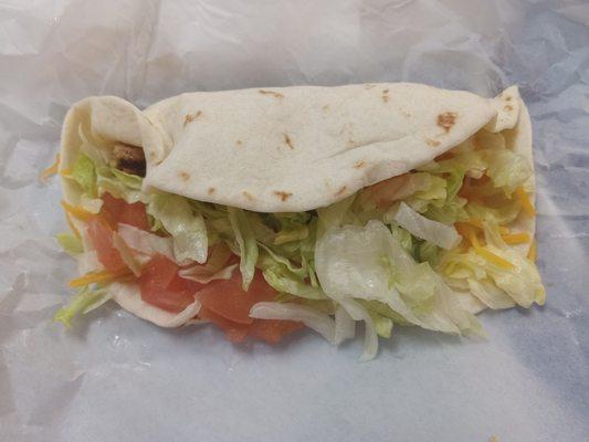 Flour tortilla makes chicken soft taco taste pasty. A little disappointing to me.