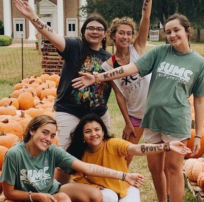 Small group in the pumpkin patch.