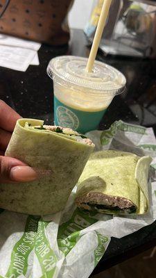 A wrap and smoothie for a toddler