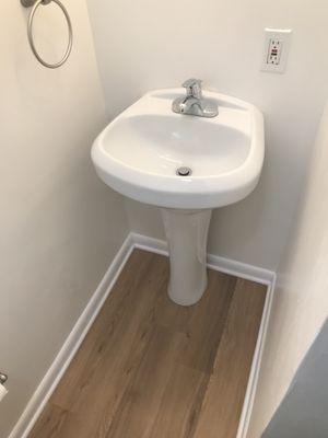 Bathroom 
LVP over concrete floor
Waterproof