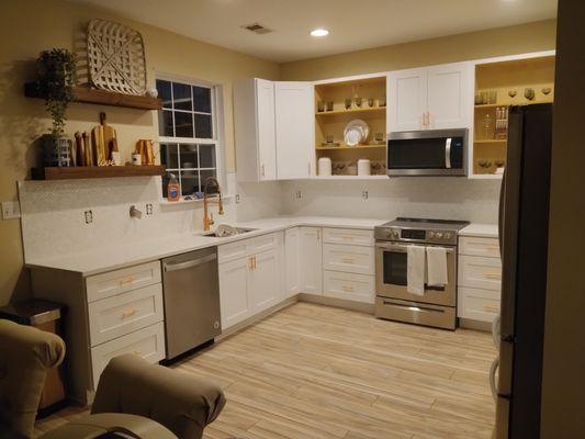 Floor, backsplash, cabinet doors and hardware install