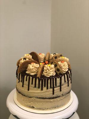 Reese's dreams cake! Fudge cake layers, peanut buttercream, ganache drip, peanut butter cookies from Moony's Sweets and Treats