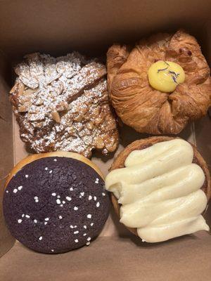 Almond croissant, blueberry calamansi, cinnamon roll with cream cheese frosting, ube custard