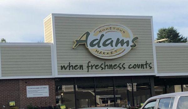 The new front sign of the remodeled Adams Hometown Market -- offering a greater variety of grocery items, a hot food bar, bakery, and more!