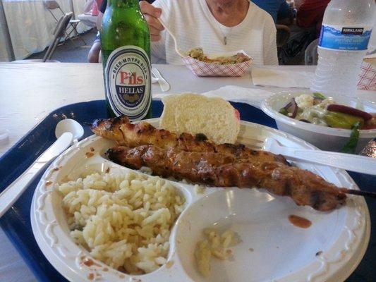 Pork and chicken kabobs with Greek beer.