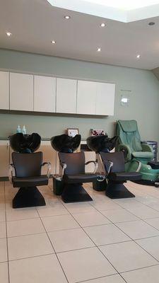 Hair washing stations and a pedicure massage chair