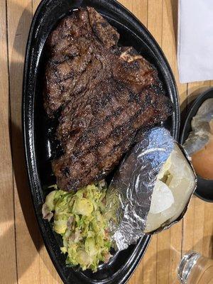 Porterhouse steak bristle sprouts and bakes potato