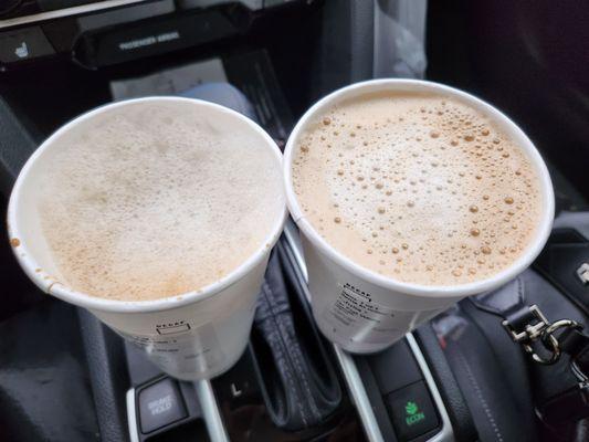 On the left, cup has airy foam and not filled to the top. Cappuccino? On the right, a normal flat white, smaller foam, and milk to the top.