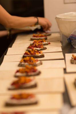 Sun dried tomatoes and sweet potato crostinis on artisan bread