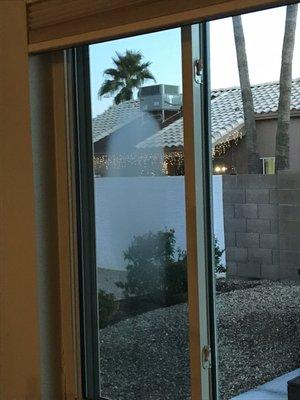 Clouding between panes in sliding glass door