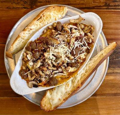 Pic 1: Pasta Arrabbiata w/ Sausage, Rstd. Chicken, Mushrooms, Red Onions, Sun-dried Tomatoes in a Zesty Tomato Cream Sauce.