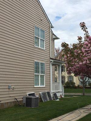 Scrubbing and washing windows and siding for our customers