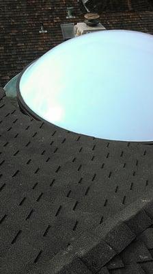 We pressured washed this roof , and cleaned the skylight to remove all bird droppings and debris.