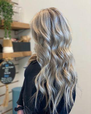 Two rows of 20" hand tied extensions with a full balayage, gray coverage color, and K18 treatment.