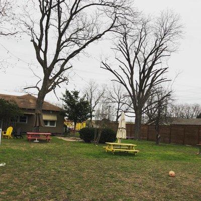 Backyard for extra seating and where the kiddos can play while the grown ups relax