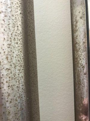 Rusty mirrors in bathroom