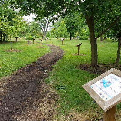 numbered story boards through the park