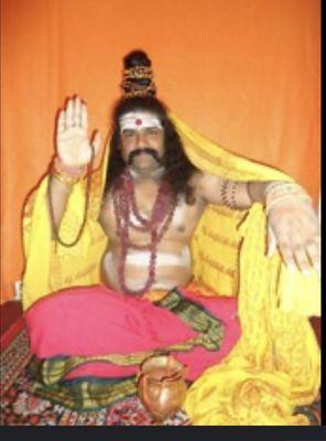 This is master RAMJI. He will read your palm and tell you past present and future.