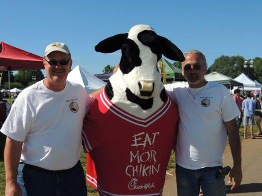 Steve & Tim enjoying a beautiful afternoon with the Chick-fil-A cow at the unveiling of Toney's Floor Care!