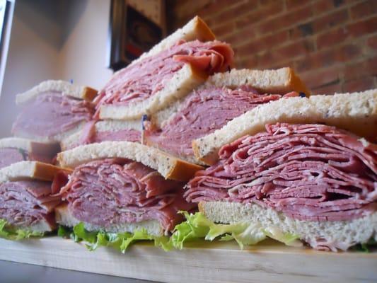 Lean & Delicious Corned Beef & Pastrami servied hot daily!