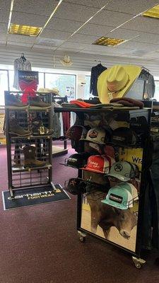 We carry Hooey ball caps, Resistol cowboy hat, and Carhartt beanies.