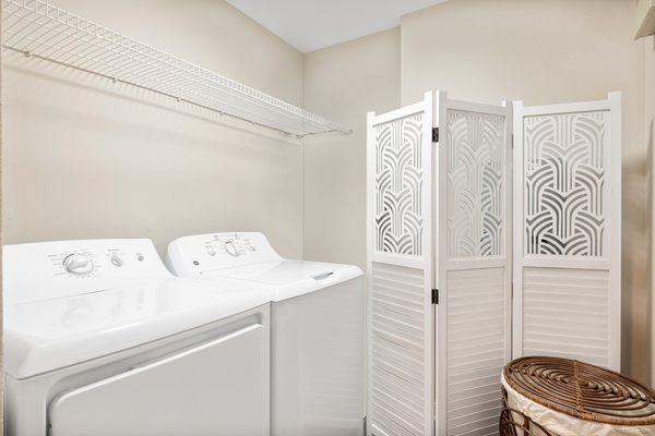 laundry area with wired shelving