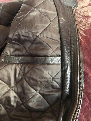 Leather jacket with a new zipper and lining.