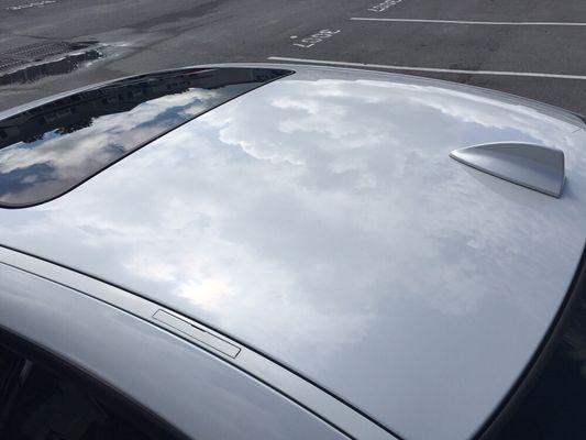 Reflection from our One-Year Sealant that was applied to this E92 BMW